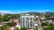2BR condo in La Cruz with pool, balcony, AC, WiFi & kitchen