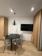 Sarbinowe Morska Bryza- Komfortowy apartament blisko plaży, idealne miejsce do odpoczynku w zaciszu!
