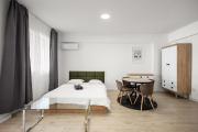 Ivory 22B7 - Modern Studio with Balcony & Parking