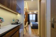 Cozy Stay Near Expo Mart Kaveri City Center