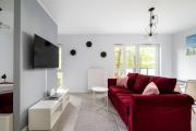 Olszowa 14 Riverside Apartment by BookingHost