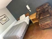 Queen Bed Hotel Room 232