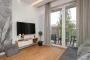 Comfortable Apartment with Air Conditioning and Parking by Noclegi Renters