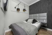 Przestronny Apartament z Sauną i Tarasem by Noclegi Renters