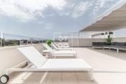 Amanecer Signature Penthouse - high-end rooftop lounge & kitchen - by OYOOSTAYS