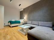 Wrocław Industrial Charm Apartment by BookingHost