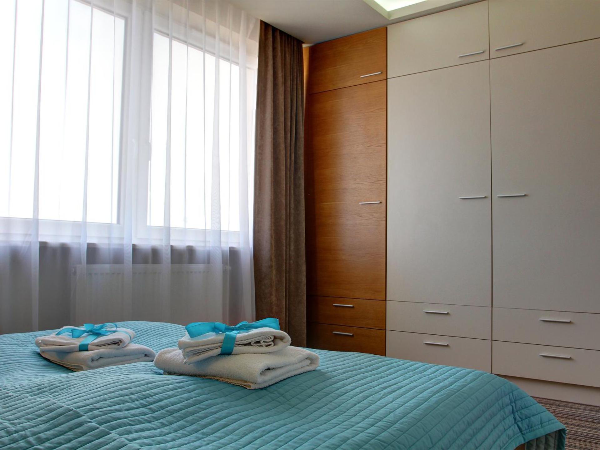 Lejlighed i 2 etager med 3 soveværelser og balkon