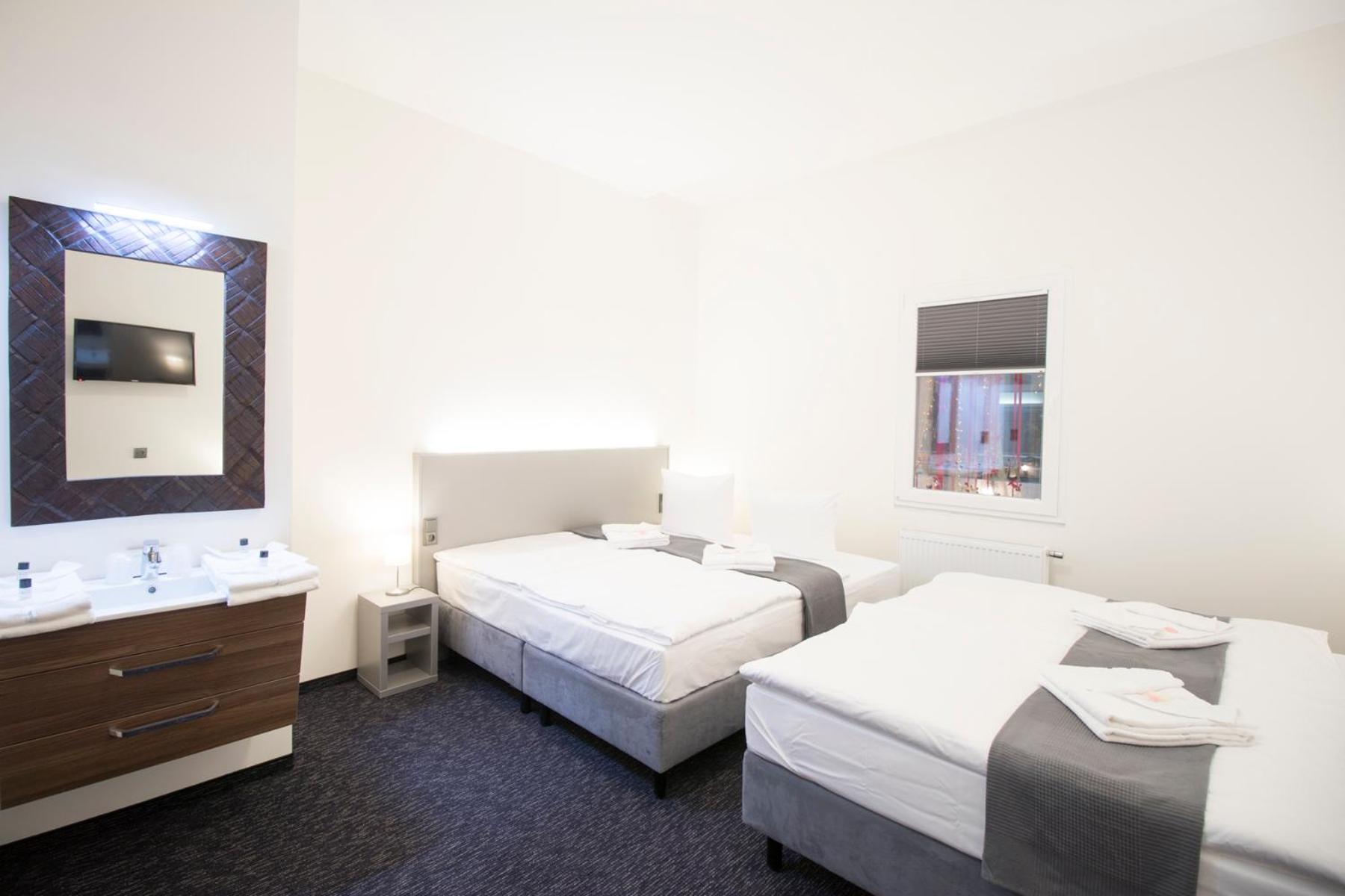 Deluxe Quadruple Room with Atrium View