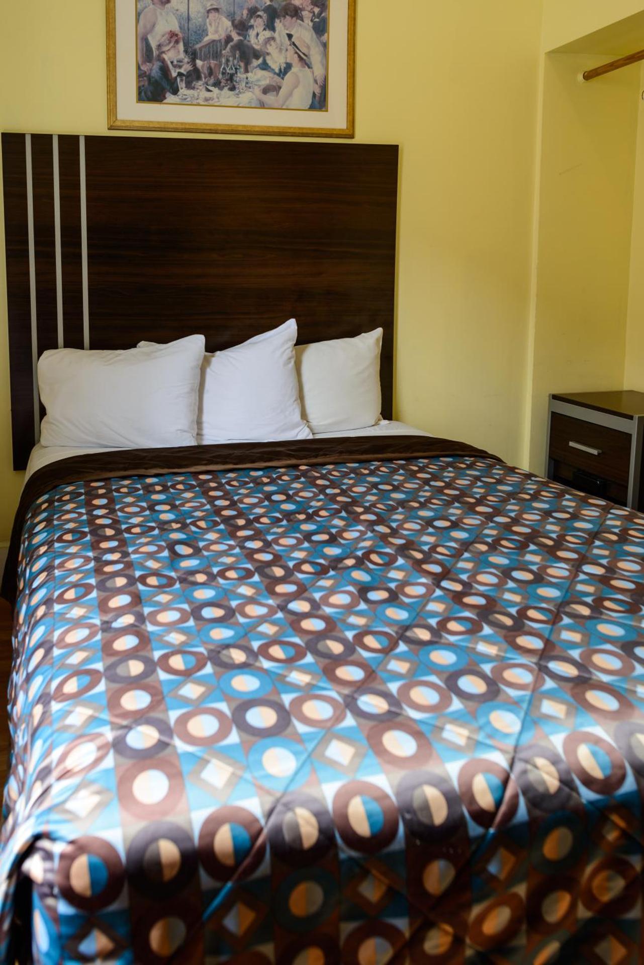 Queen Room with Shared Bathroom