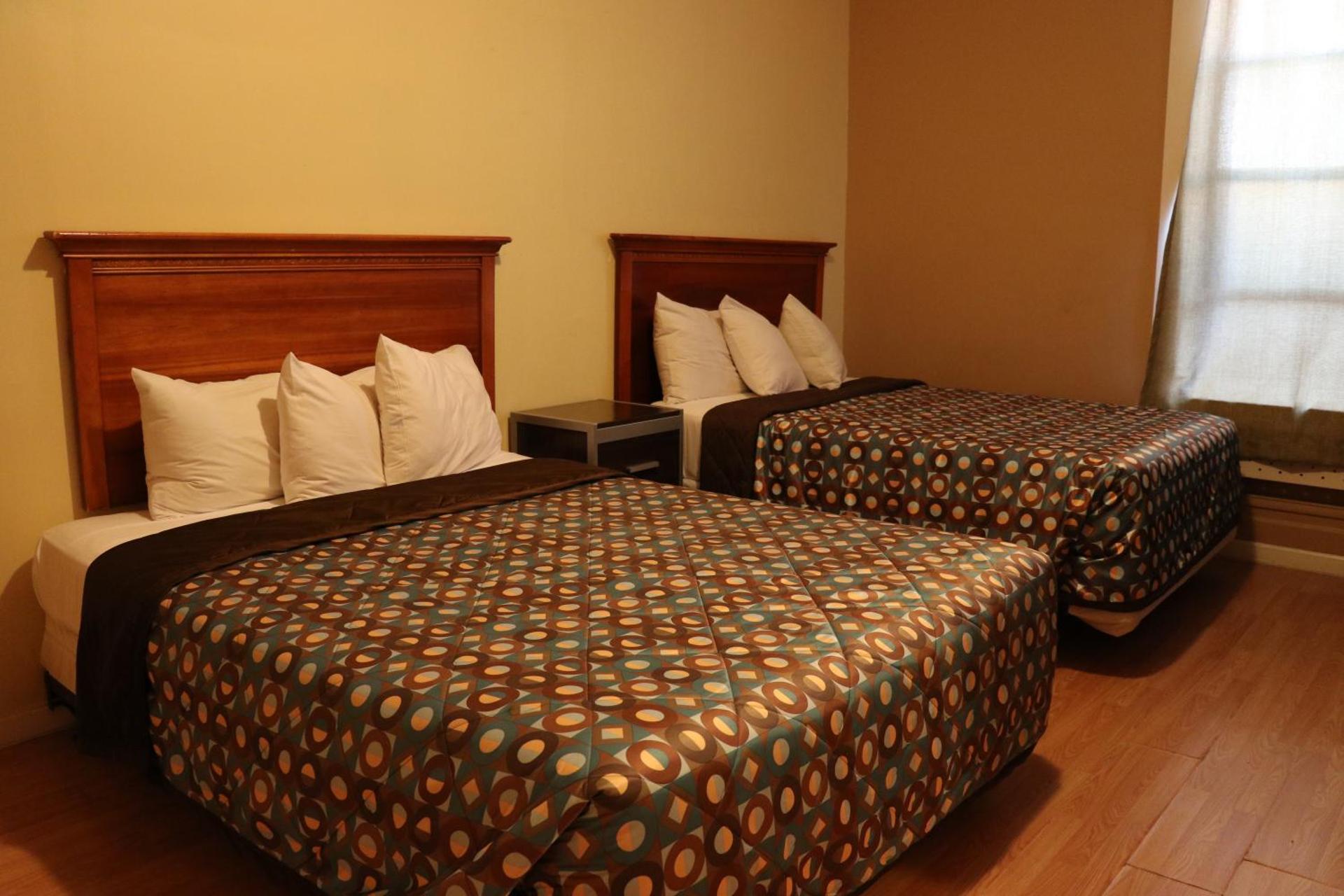 Double Room with Two Double Beds and Shared Bathroom