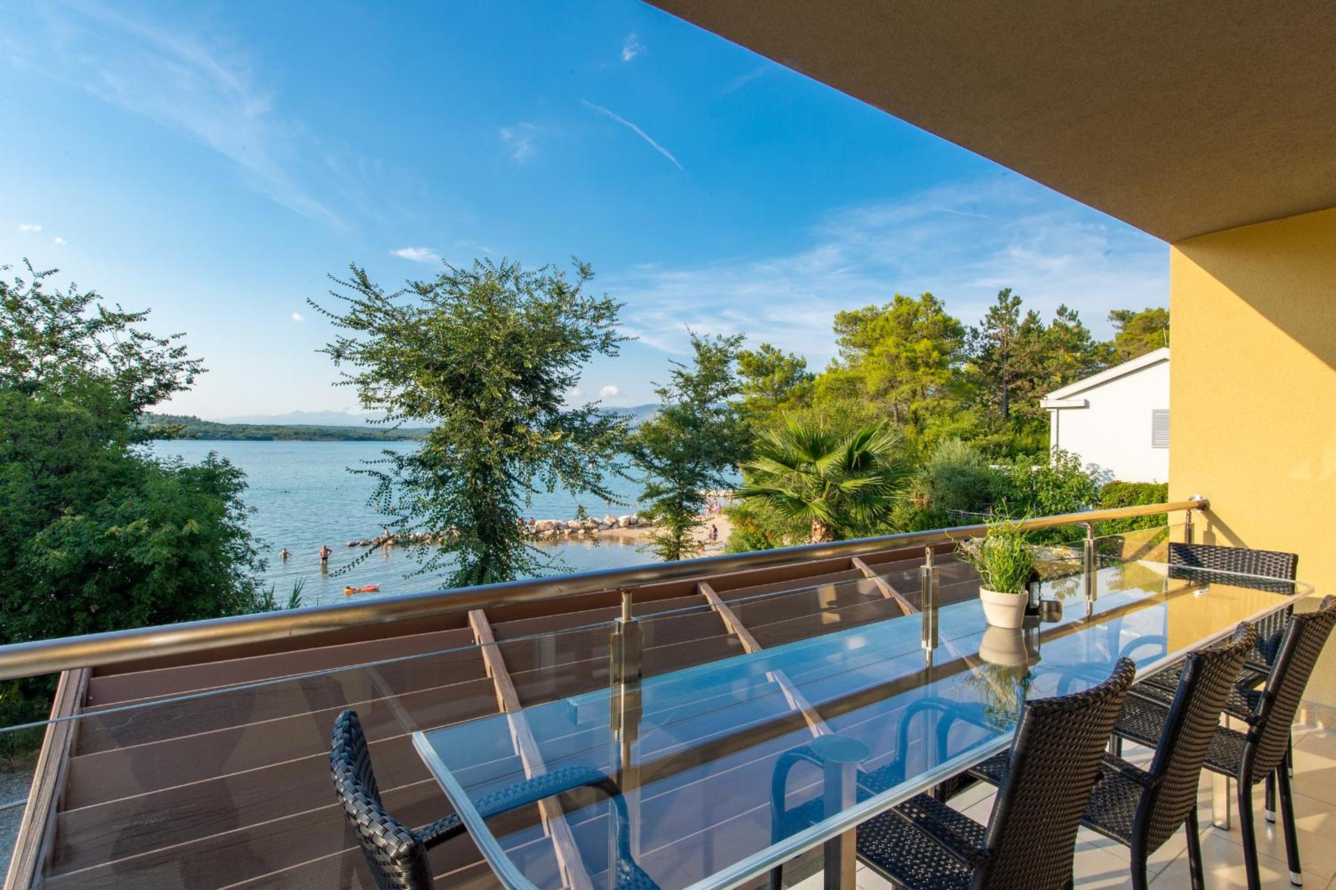 Executive Three-Bedroom Apartment with Balcony and Sea View