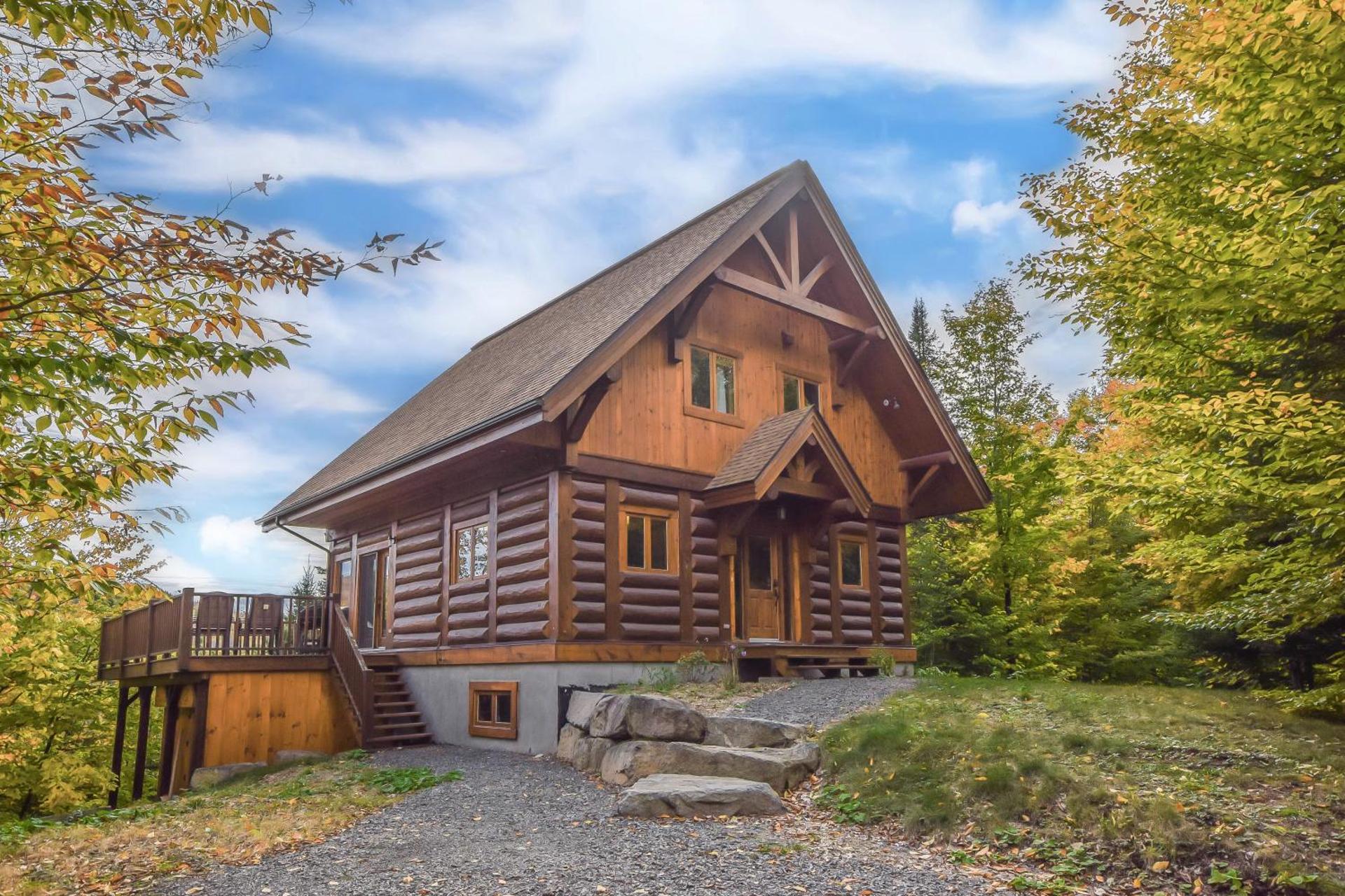 Log Cabin Home with Lake and Mountain view by Reserver.ca