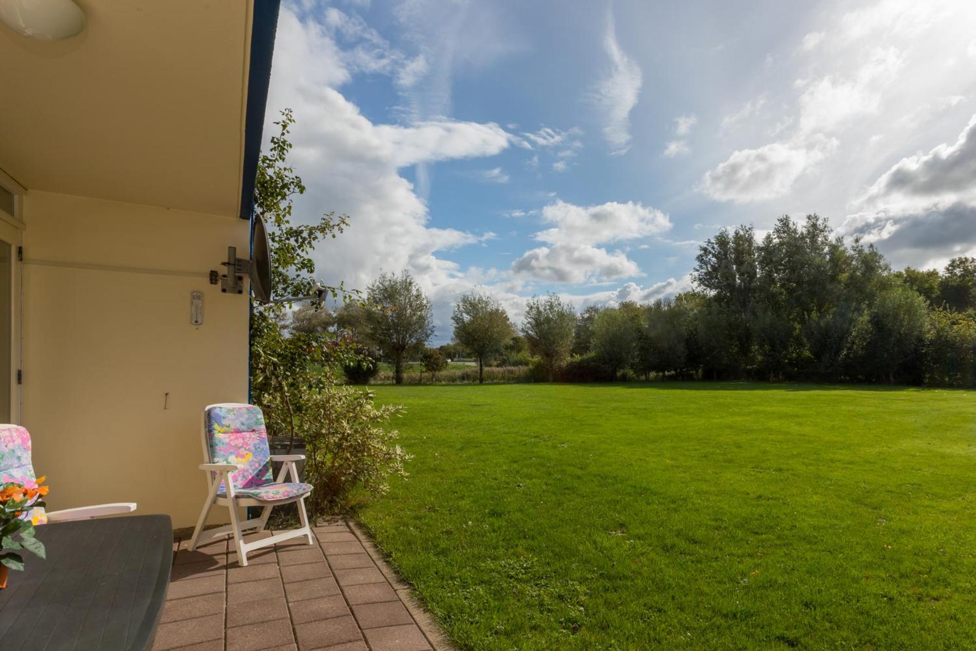 Welcome in - Appartement dichtbij het strand, met fietsenberging en ruim terras
