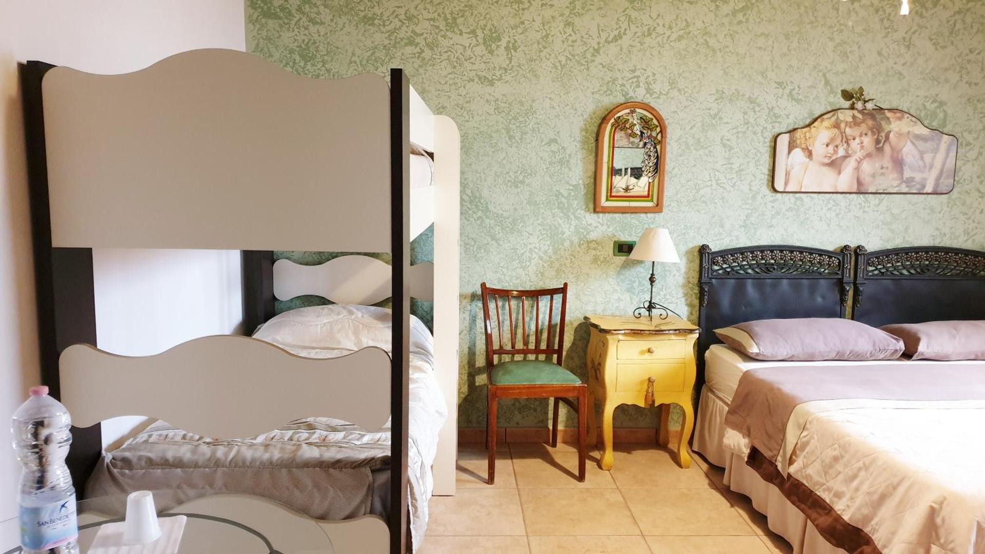 Quadruple Room with Private Bathroom