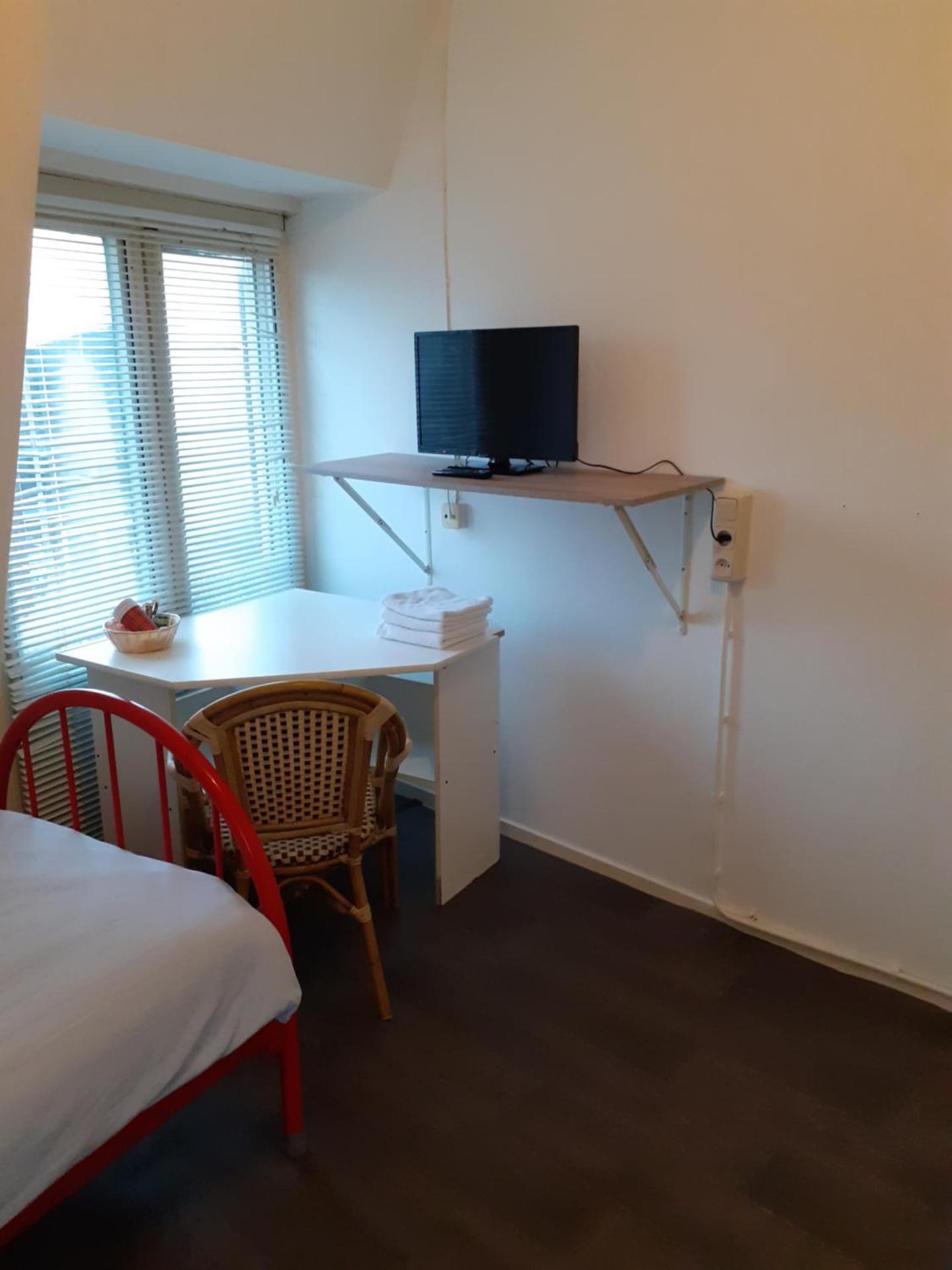 Single Room with Shared Shower and Toilet