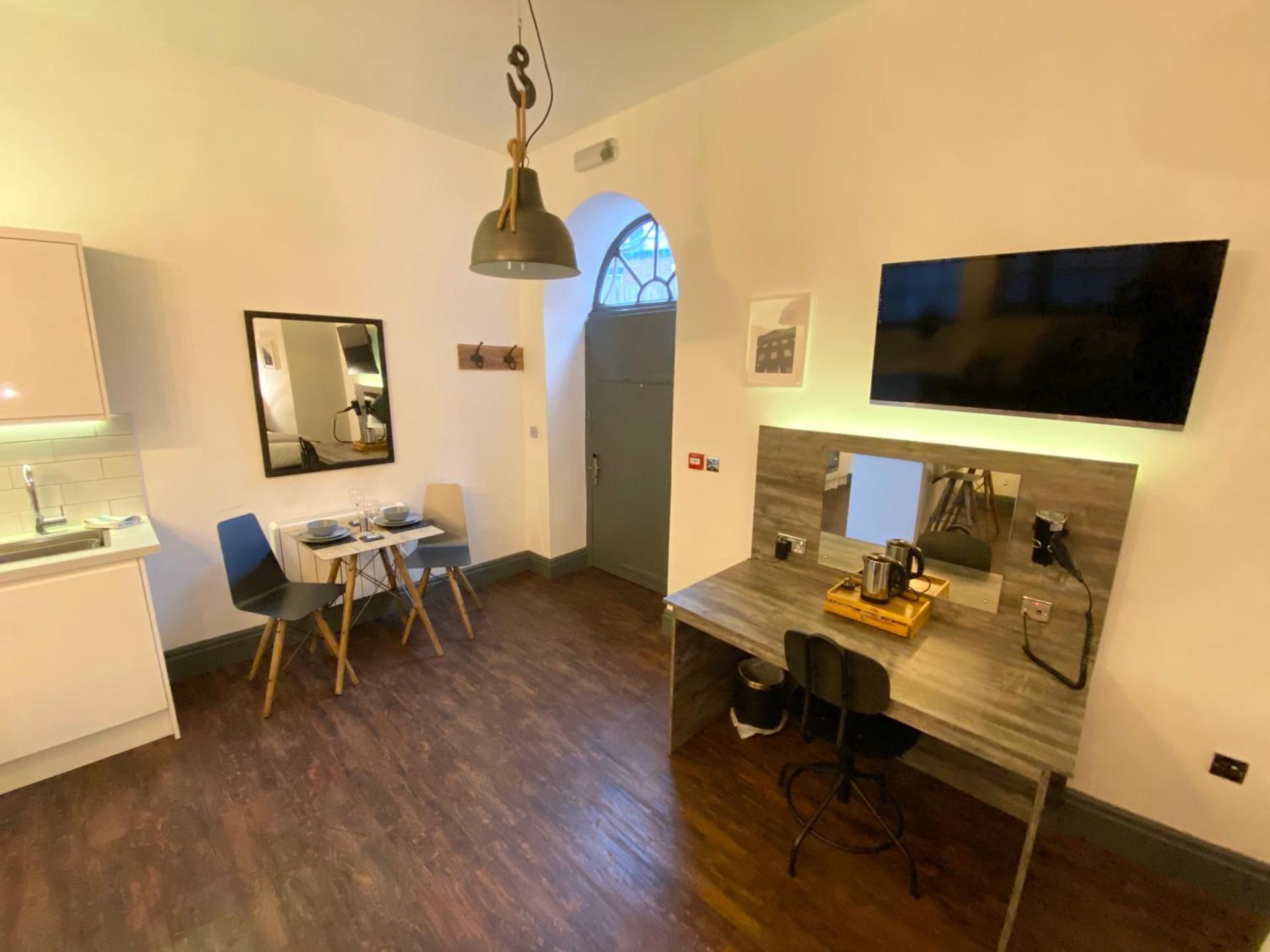 Studio at The Coach House Apartments