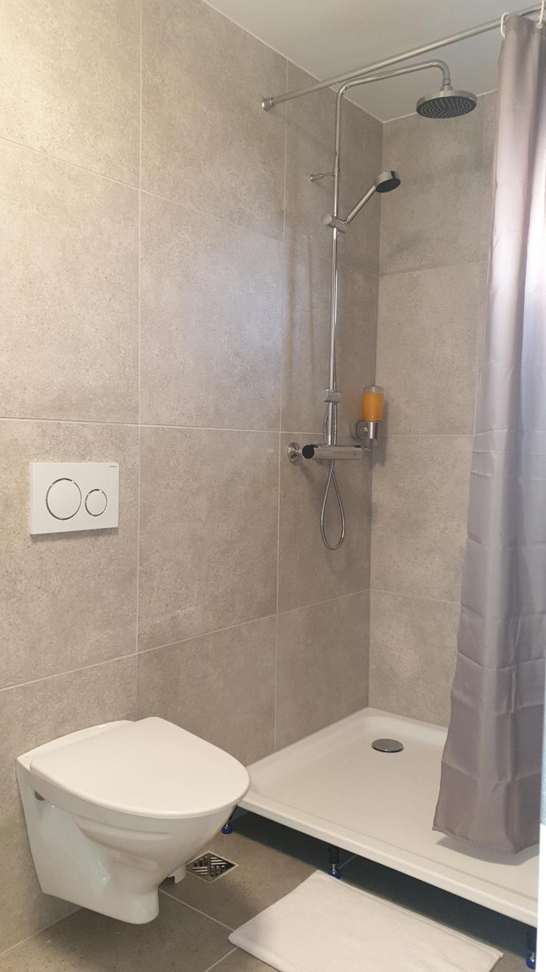 Quadruple Room with Private Bathroom