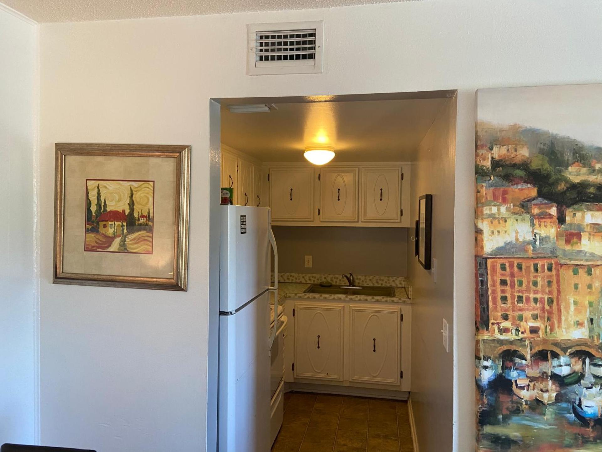 Private room in a 2 bedroom 1 bathroom shared with host, on the beach, surrounded by resorts, only 2 people MAX