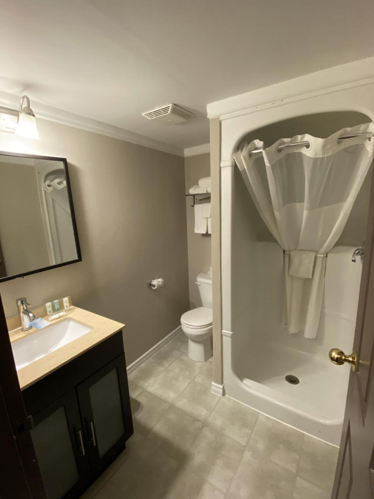 1 King Bed, Suite - Non-Smoking Exterior Building