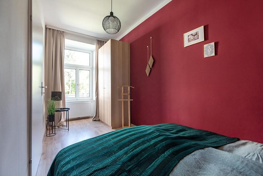 Colorful Apartment Facing Green Courtyard