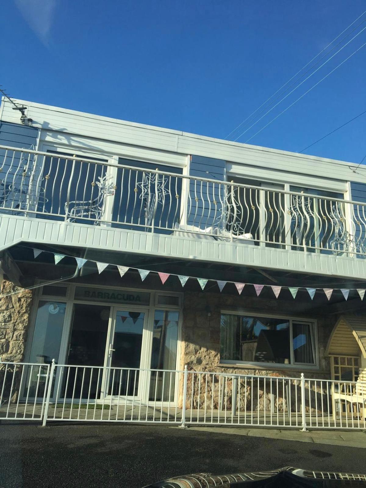 Barracuda, Beachside Apartment