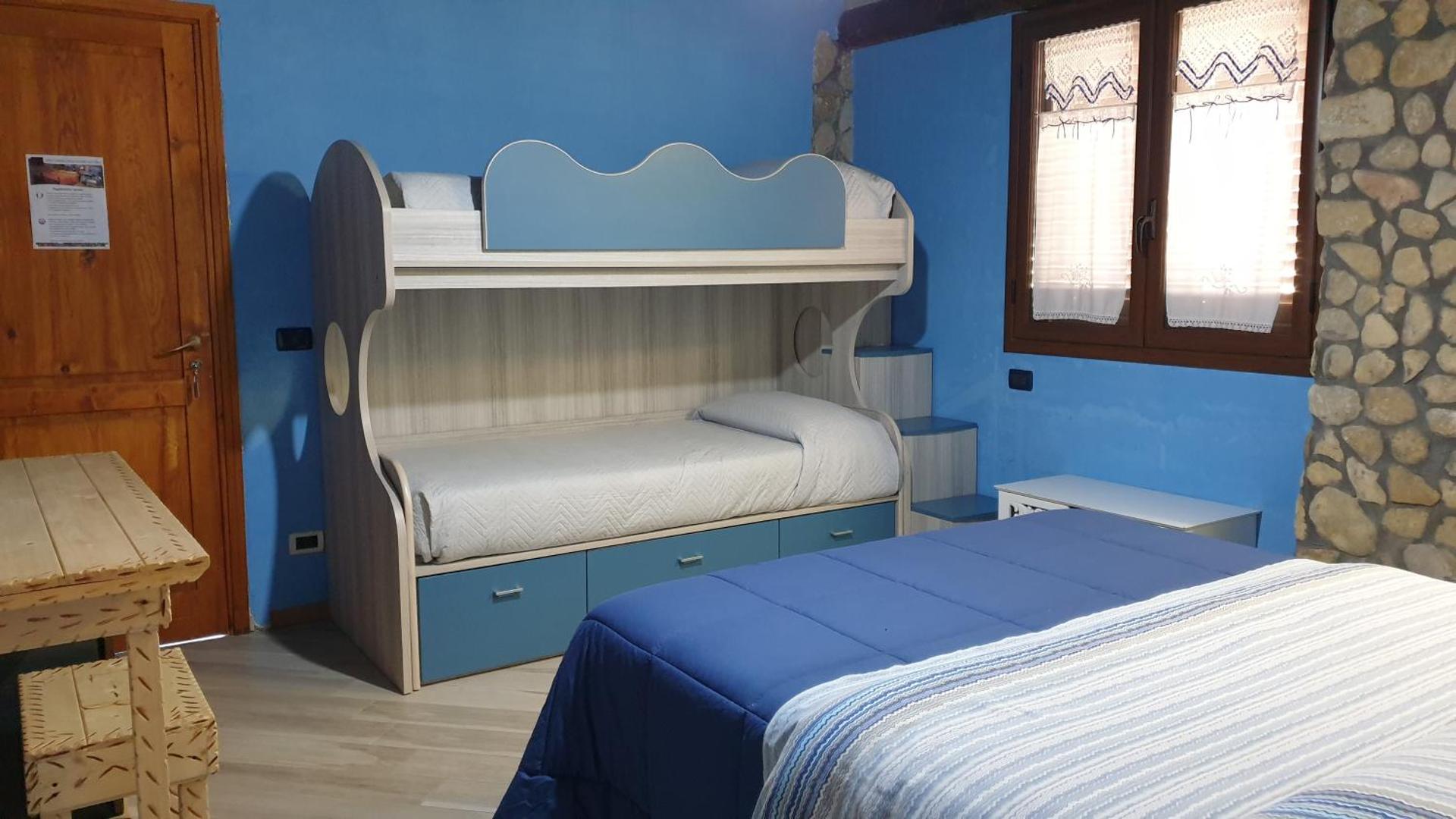 Quadruple Room with Private Bathroom