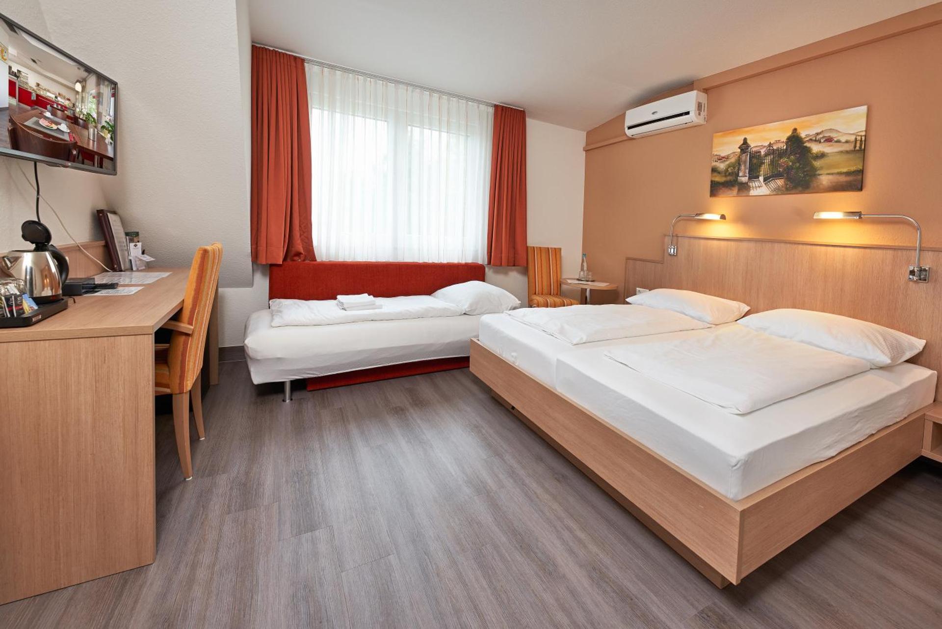 Triple Room (2 Adults + 1 Child)