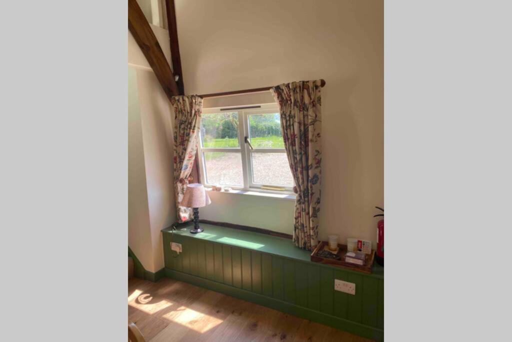 Gorgeous comfortable barn with huge private orchard in quiet Suffolk location