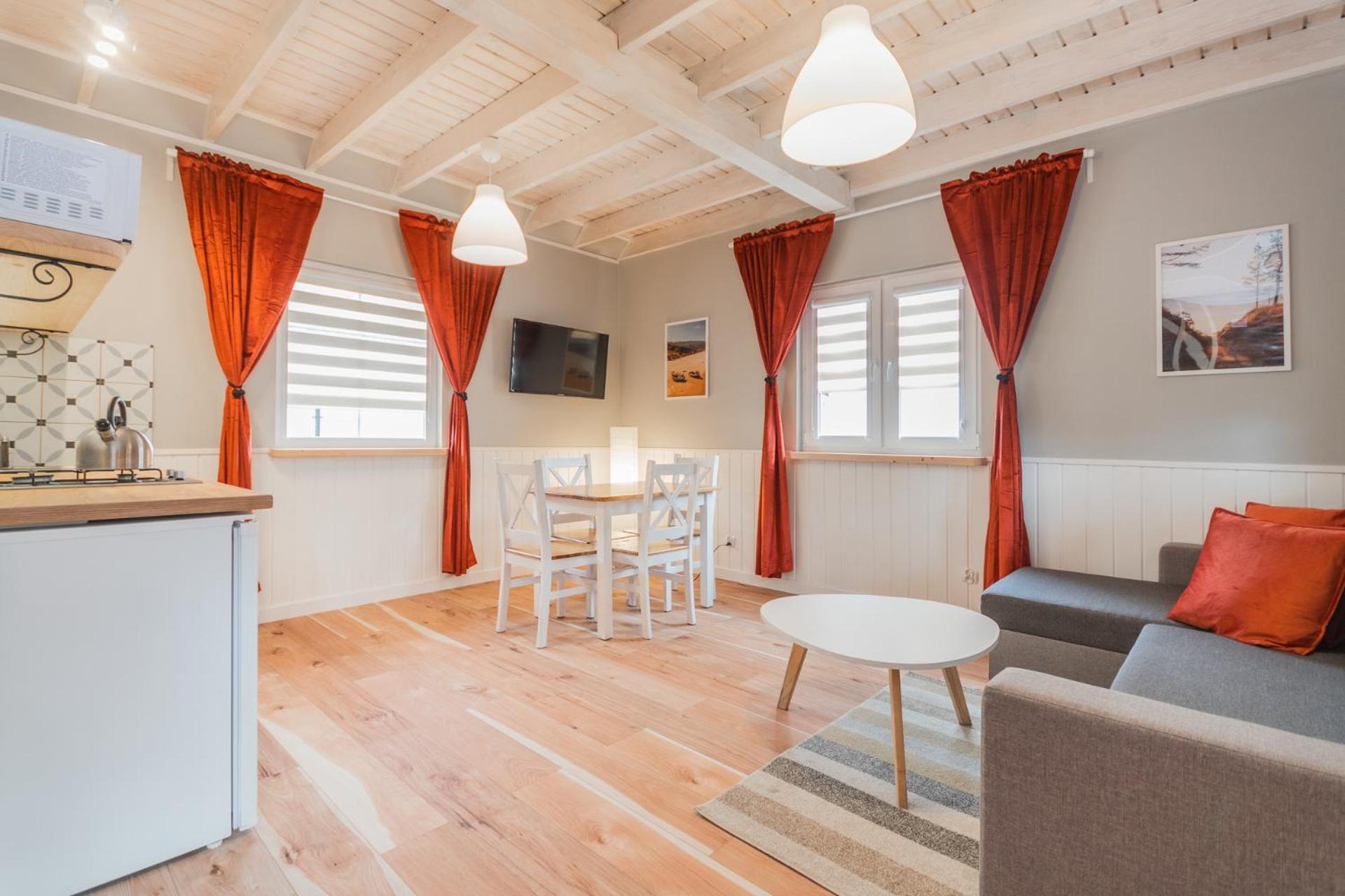 Bryza Jantar apartamenty z sauną & domki z kominkami