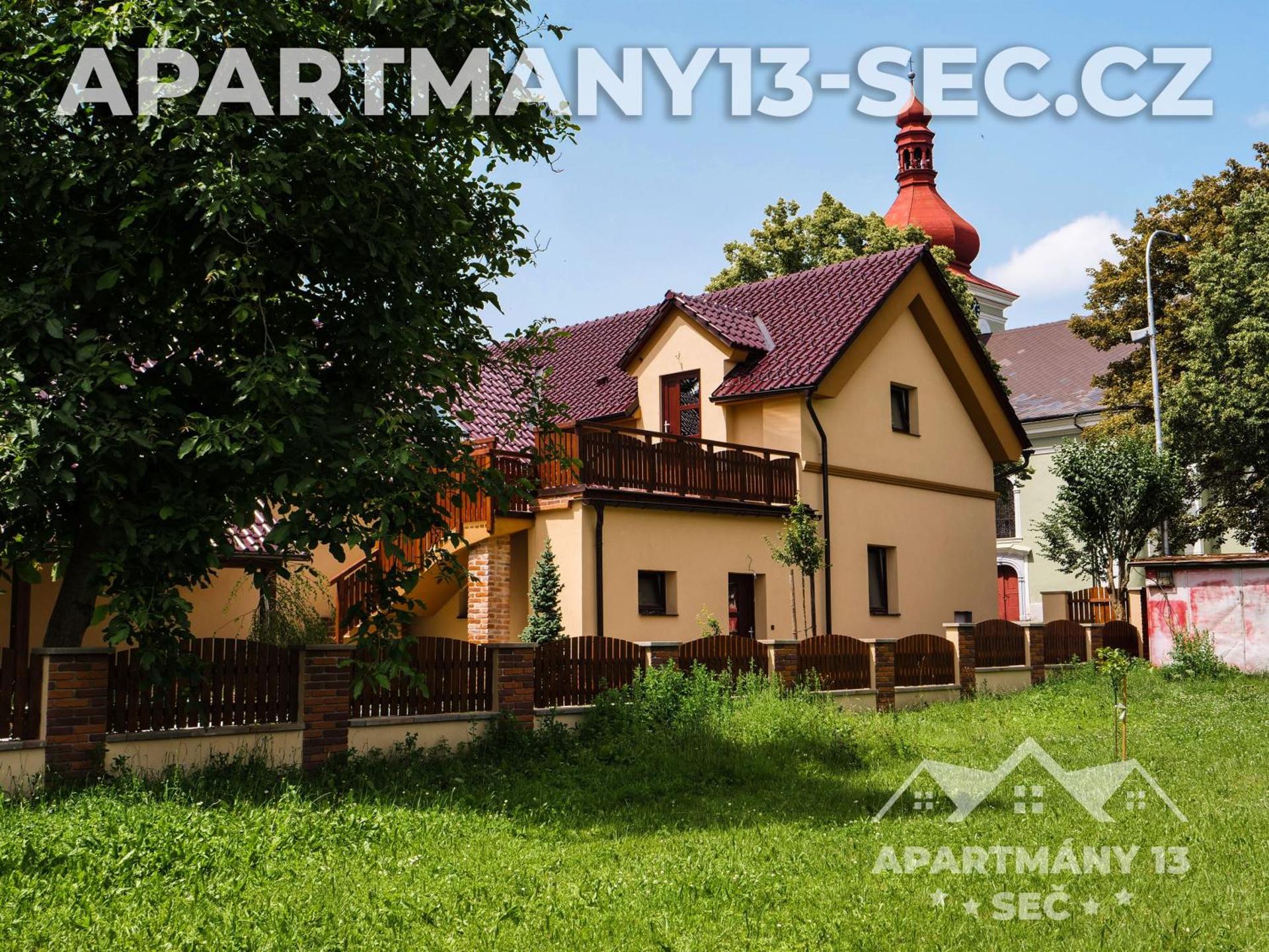 Apartmanový dům 13 Podkroví 1