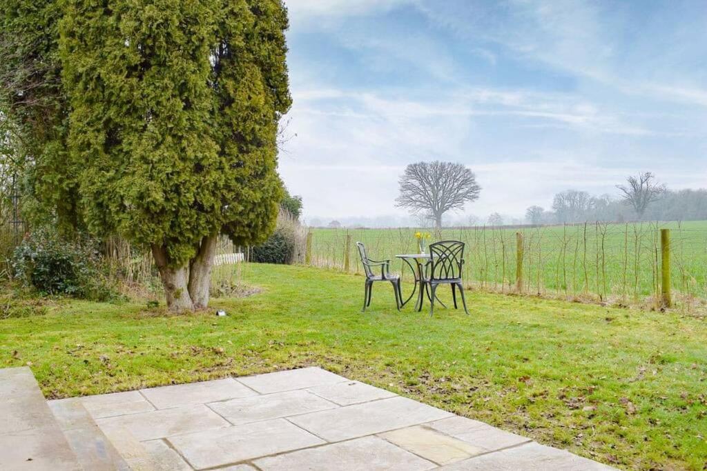 Secluded Log Cabin in beautiful private gardens