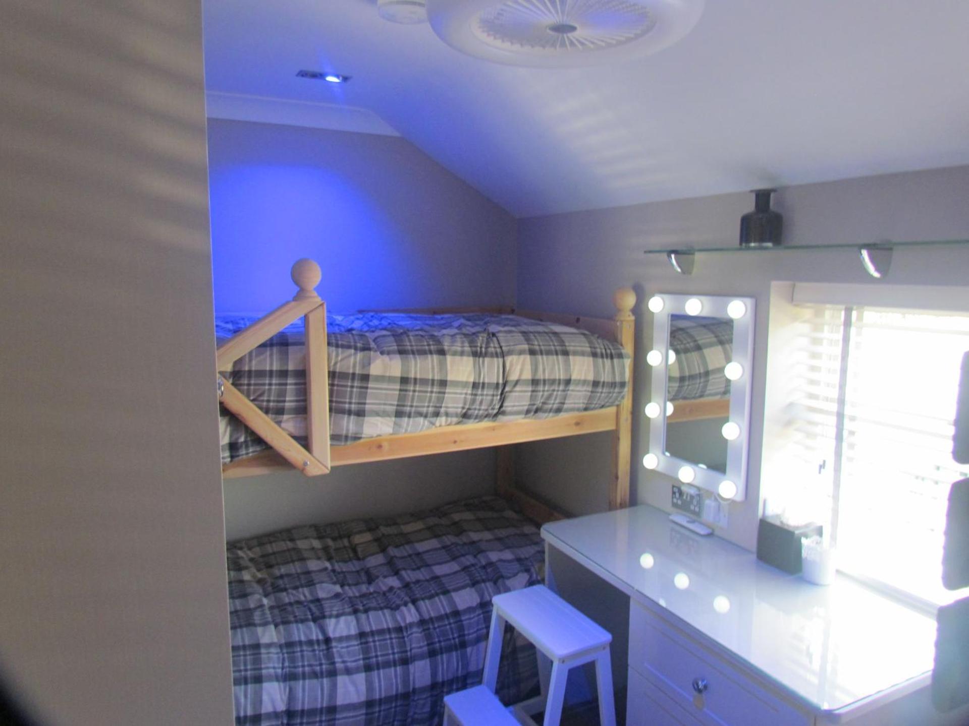  Bunk bed room with bathroom.