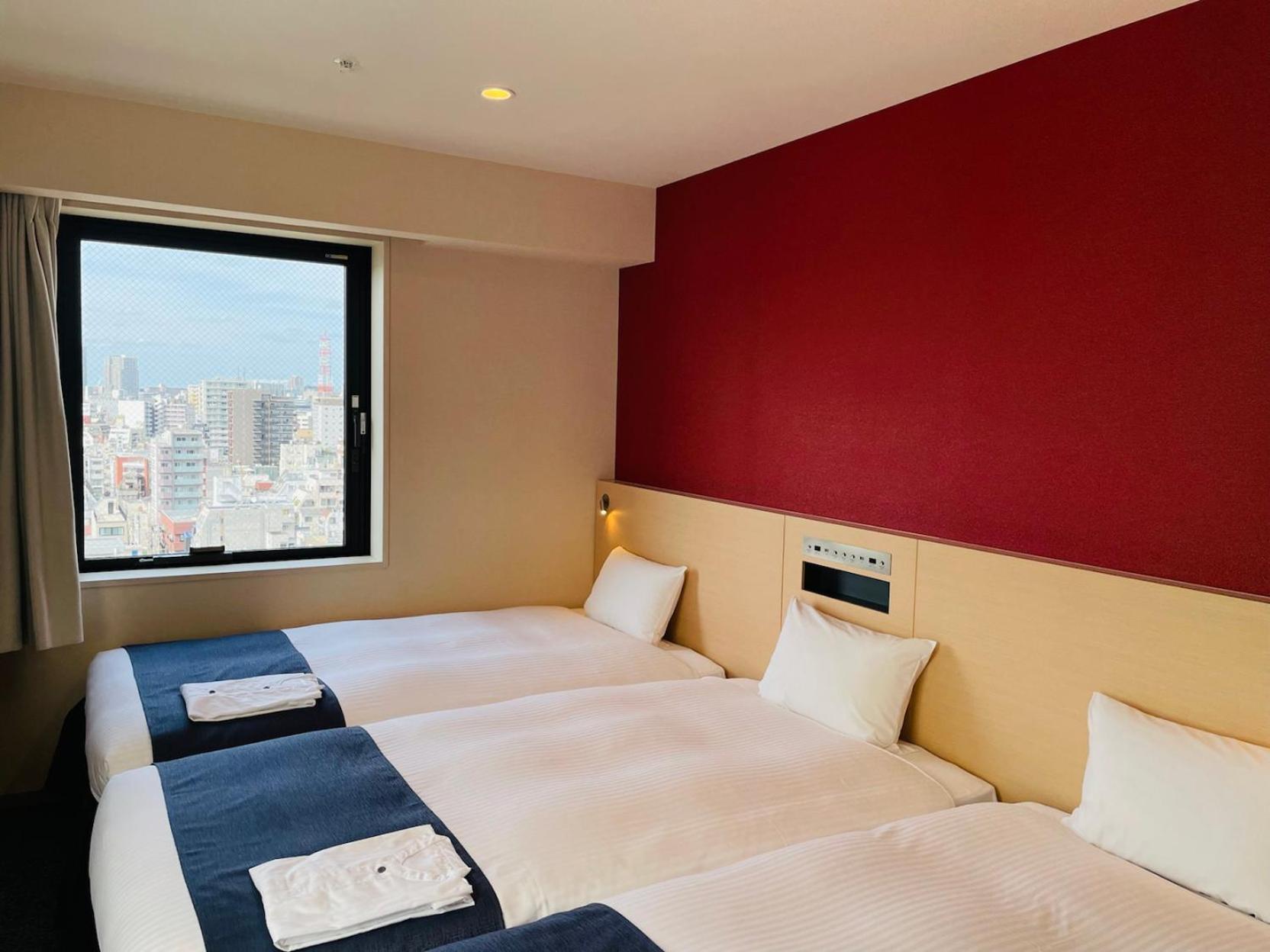 3-personersværelse med udsigt til byen