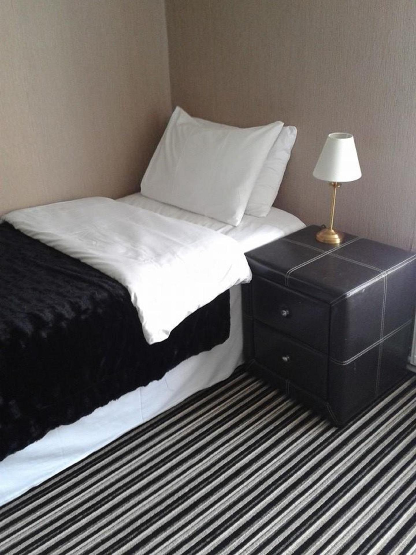 Single Room with Shared Bathroom