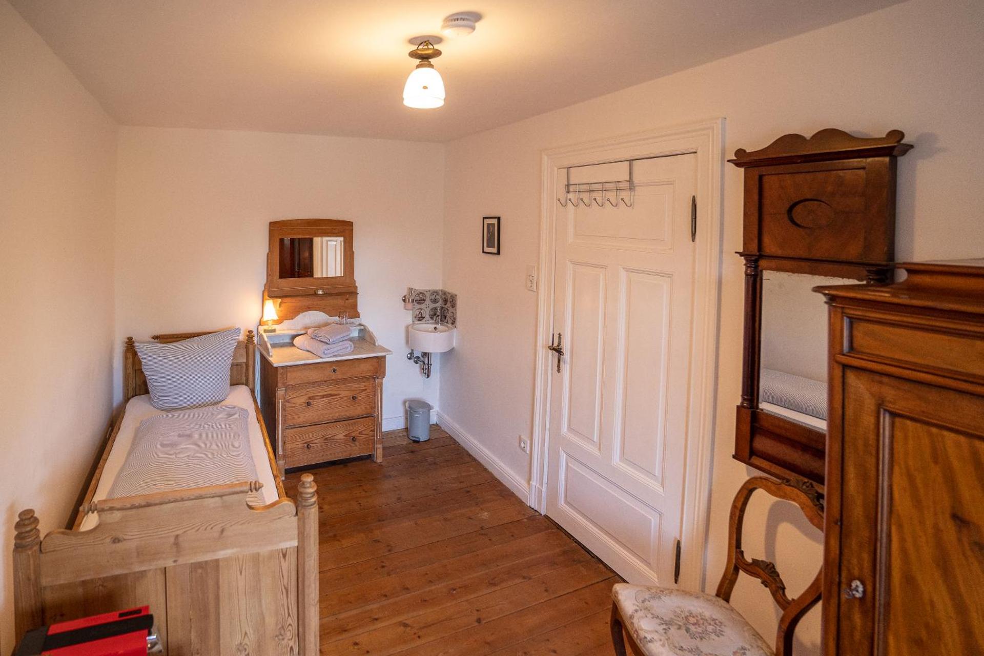 Single Room with Shared Shower and Toilet