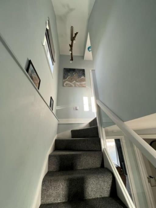 Orchard Lodge -Coastal Retreat, new build, village views, private garden and terrace