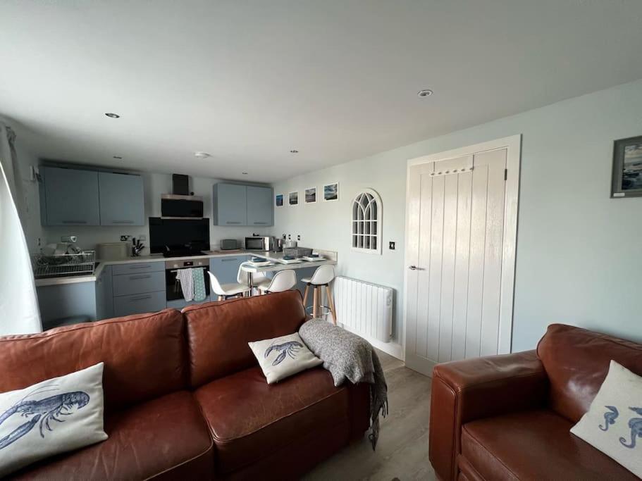 Orchard Lodge -Coastal Retreat, new build, village views, private garden and terrace