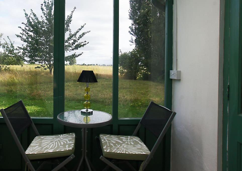 Cozy cottage overlooking fields, Upwell