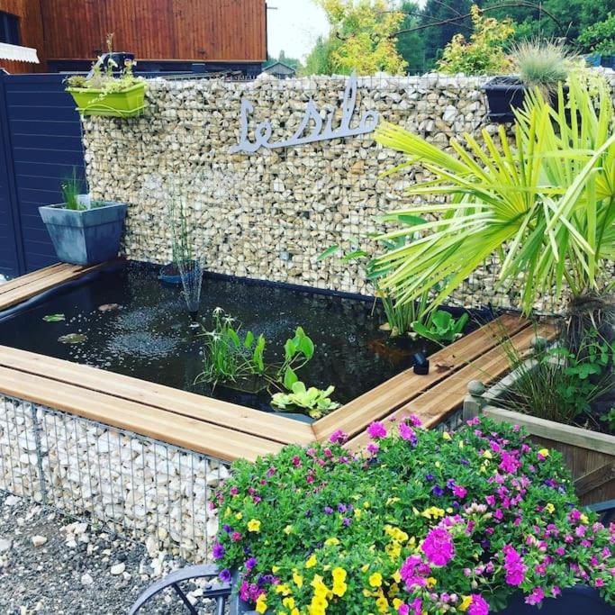 Gîte du Silo Loft atypique ,Tournesol , spa&piscine couverte