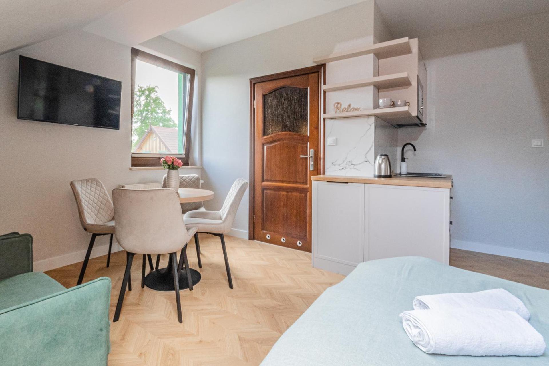 Apartamenty Gajówka- rowery, plac zabaw, sauna, jacuzzi