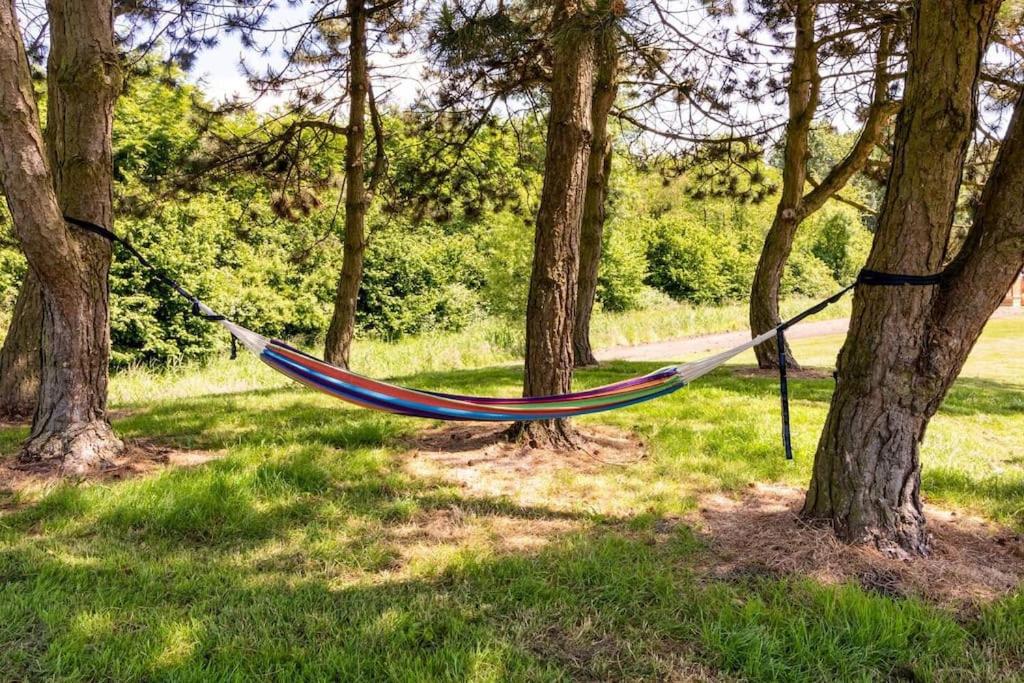 Green Tiny House with shared pool
