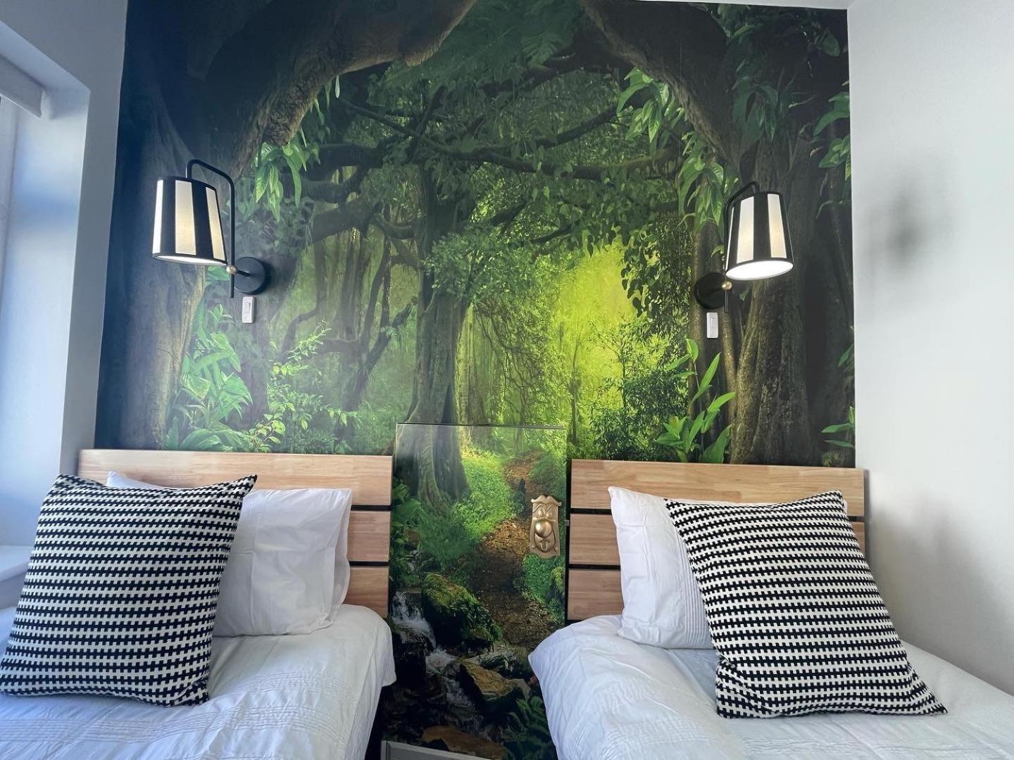 The Alice Apartment - by Coastline Retreats - Stunning Balcony Apartment with Sea Views - Alice in Wonderland Themed Secret Room - Luxury Copper Bath in Master Bedroom