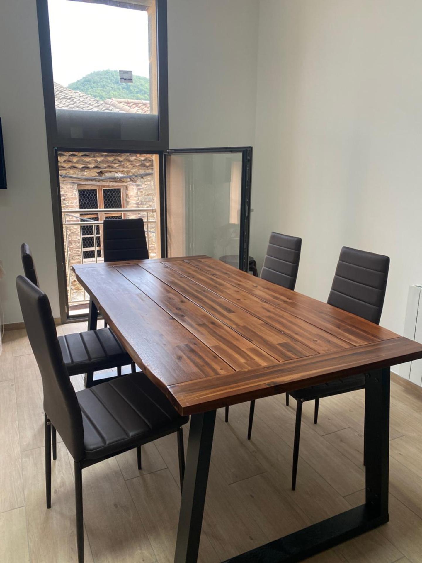 Appartements neufs avec garages dans maison de village