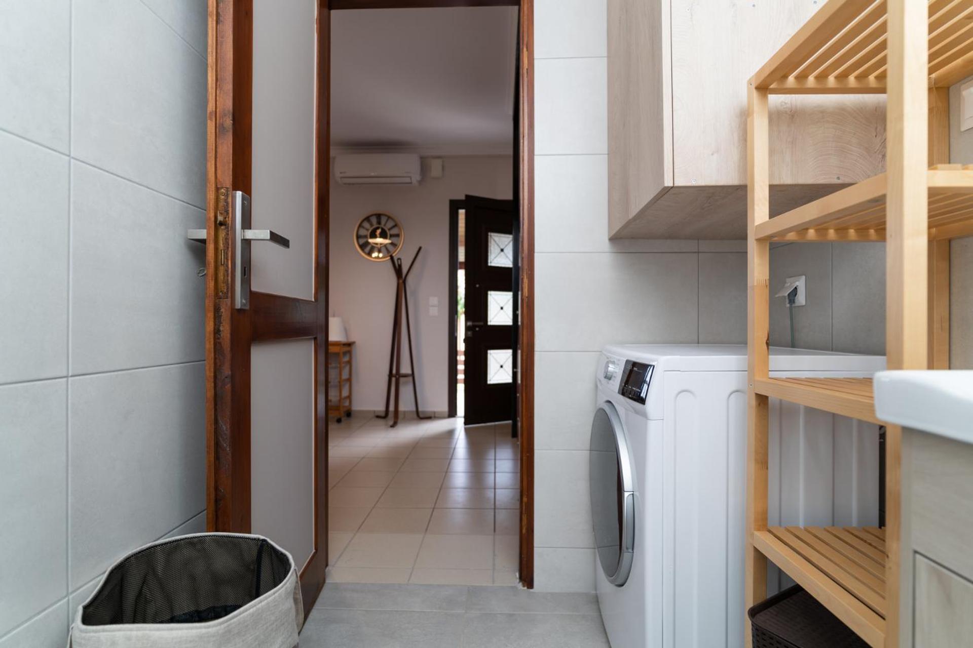 Παραθαλάσσια κατοικία με μπάρμπεκιου και τζακούζι