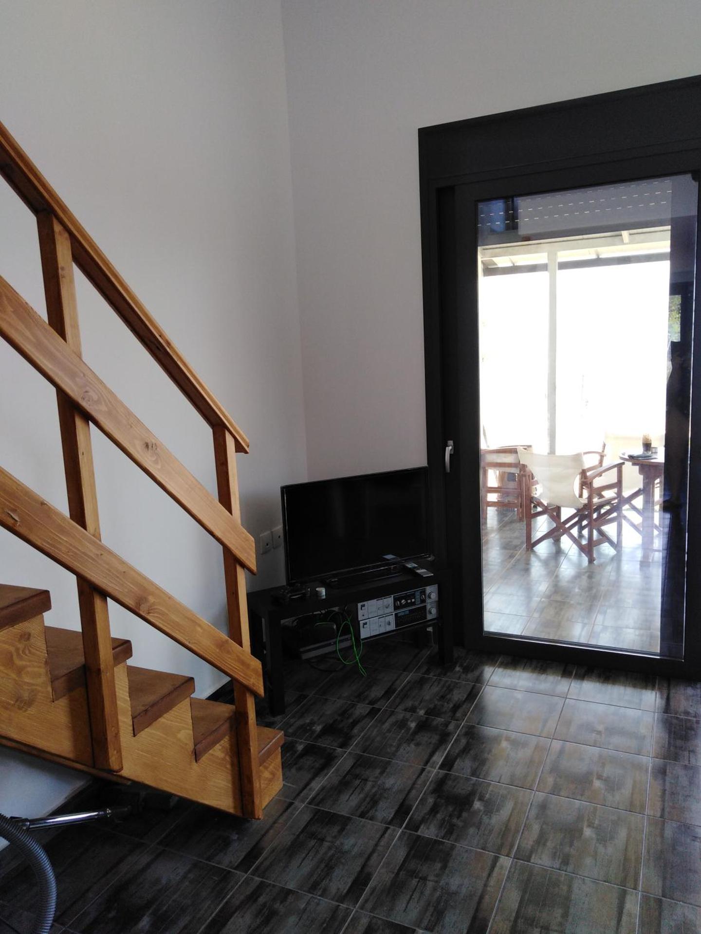 Σπίτι με σοφίτα μπροστά στη θάλασσα