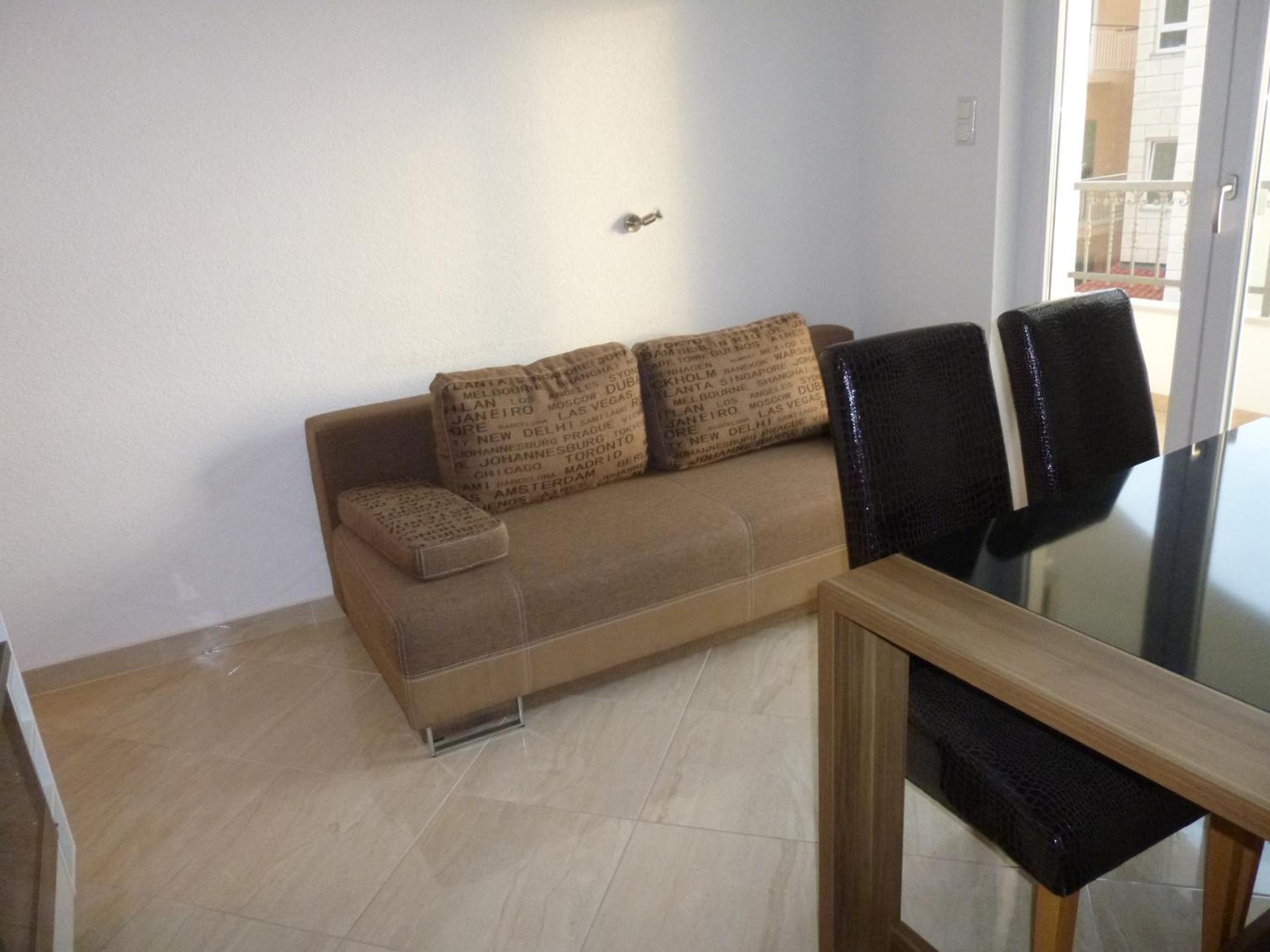 One-Bedroom Apartment with Balcony and Sea View