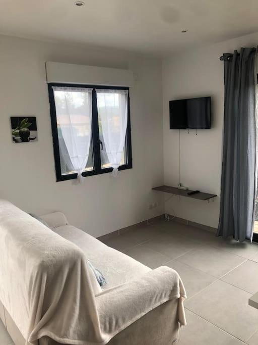 Charment logement avec parking et jardin privatif