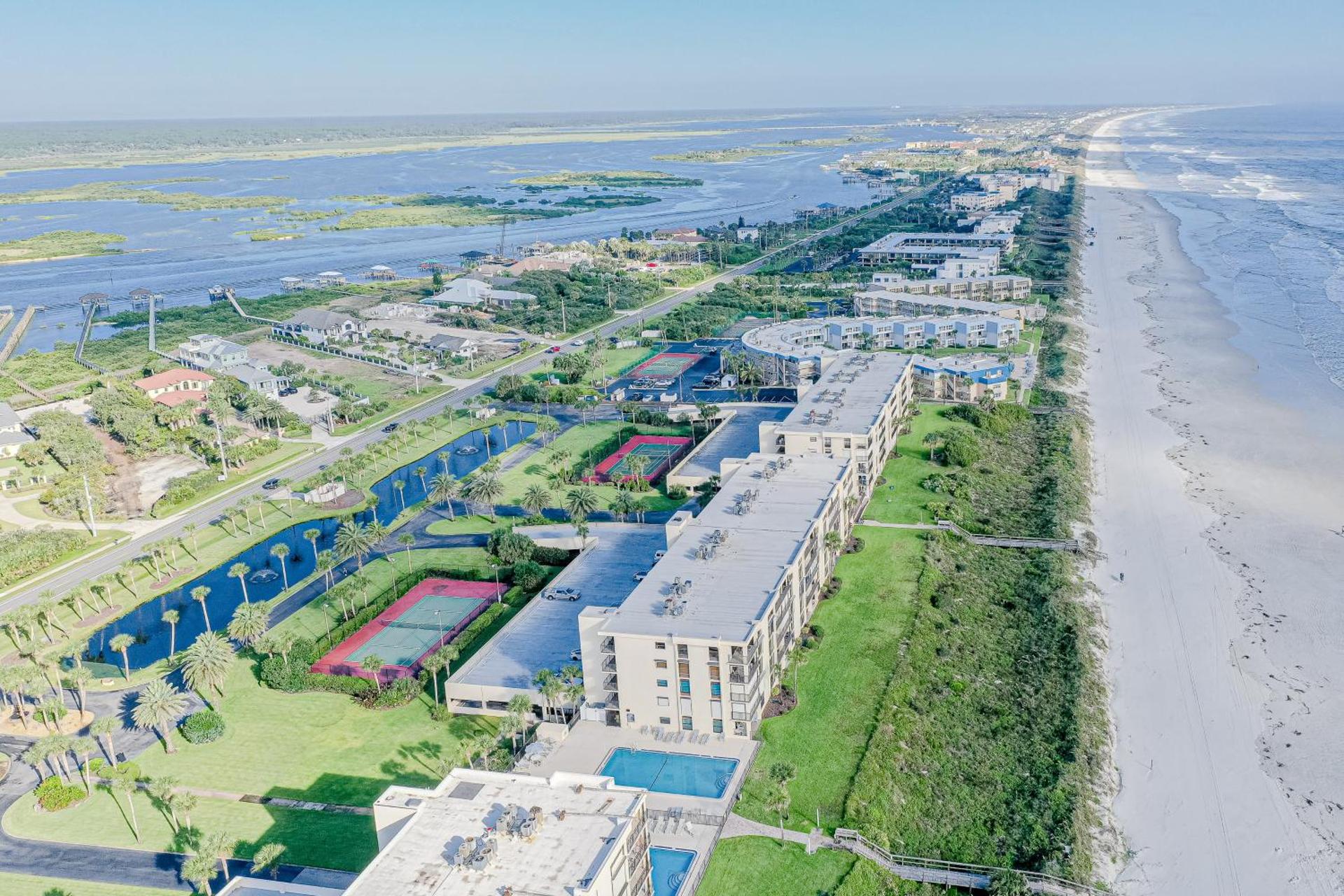 Fantastic home with views of sunrises, sunsets, & dolphins + WiFi & shared pool