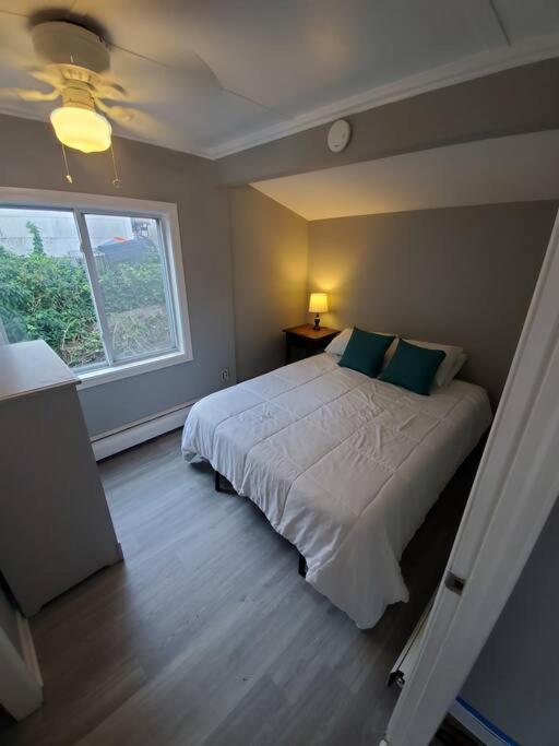 Beachy Bay Breeze Bungalow 2BR with parking and close to many amenities.