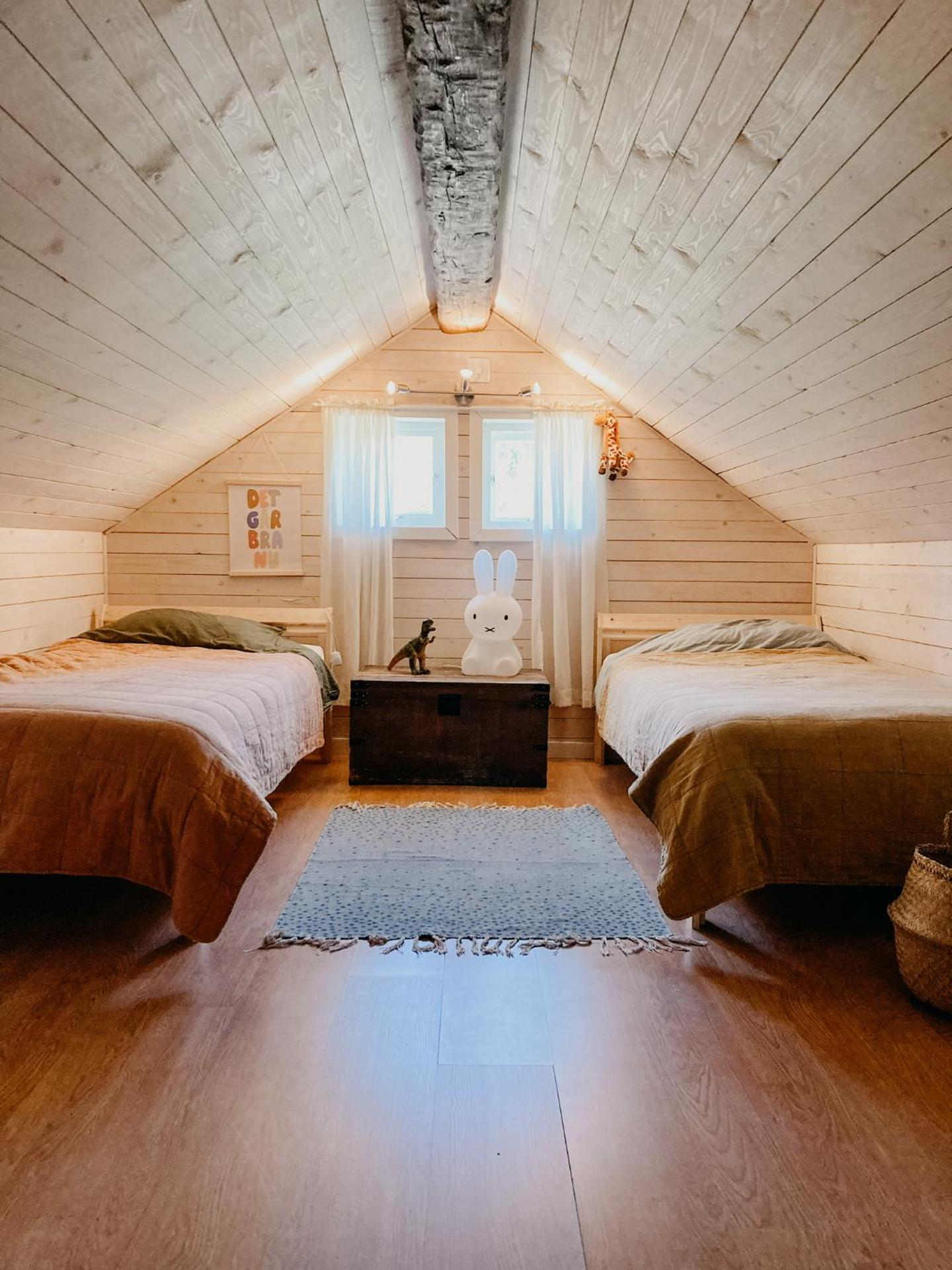 Luxurious red cottage with wood stove near lake